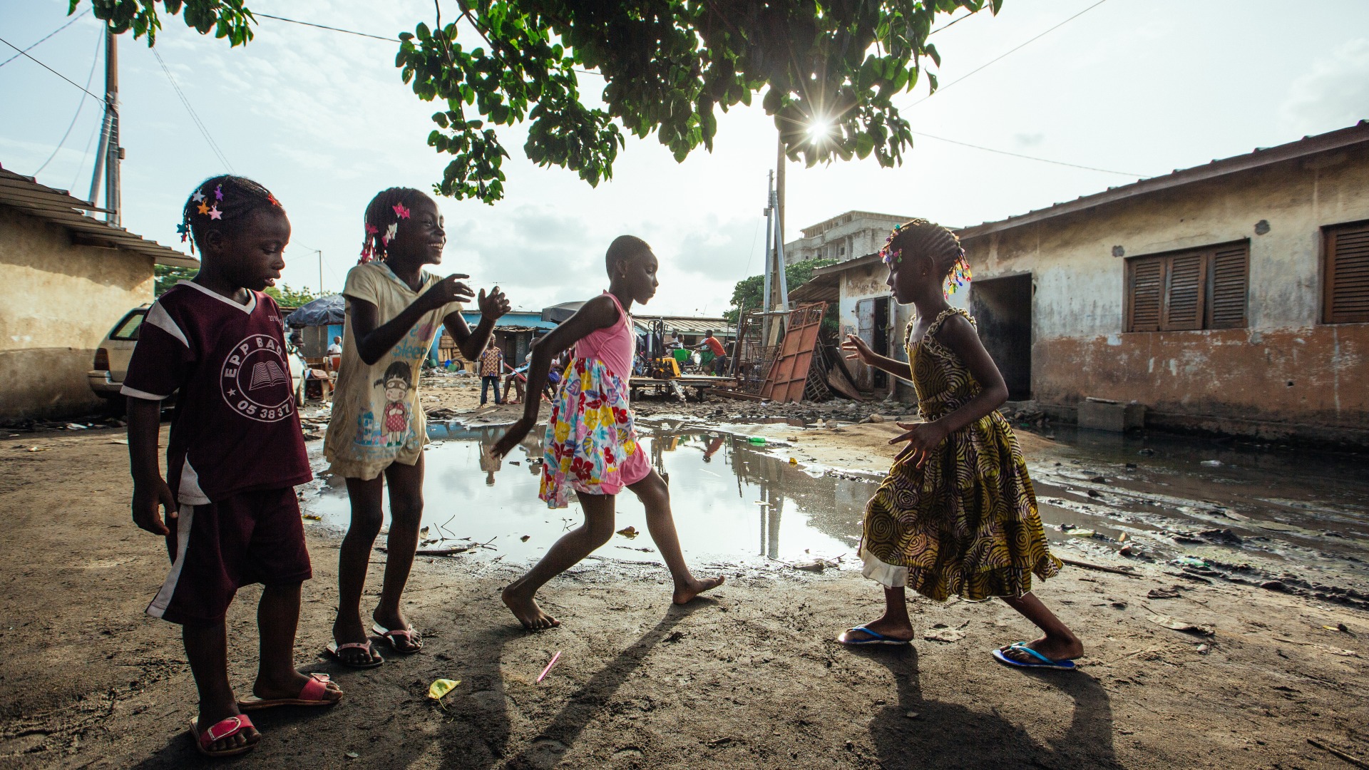 Girls play in their neighborhood in Abidjan, a city in the south of Ivory Coast.