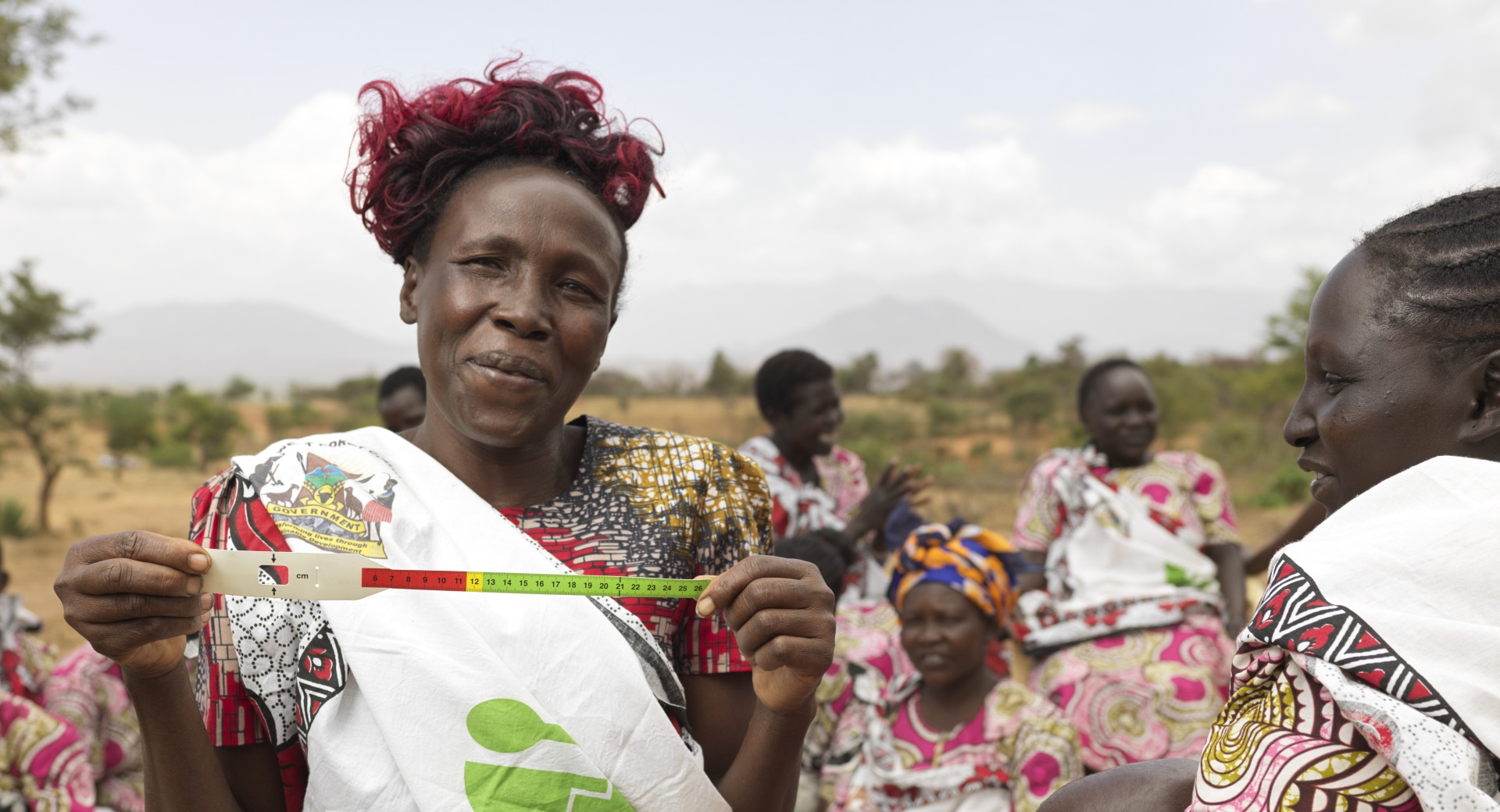 Rose shows the MUAC band, a tool to help mothers detect malnutrition at home.