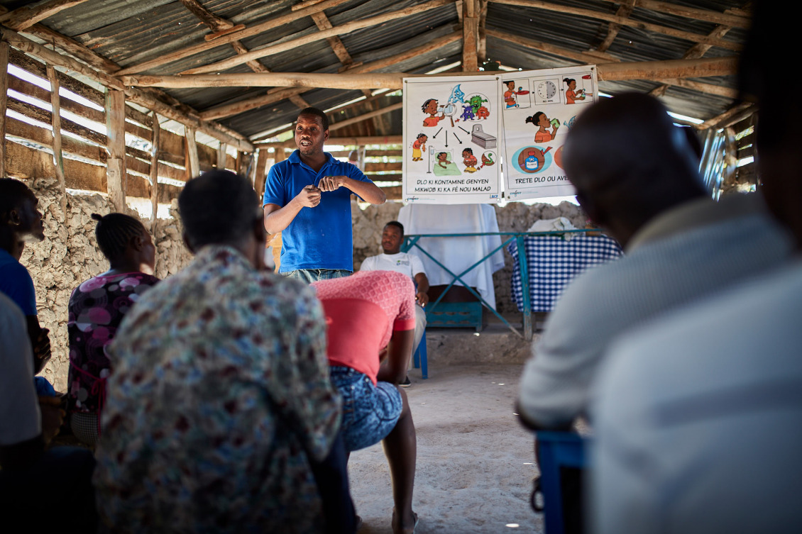 A community session on hygiene in Haiti.