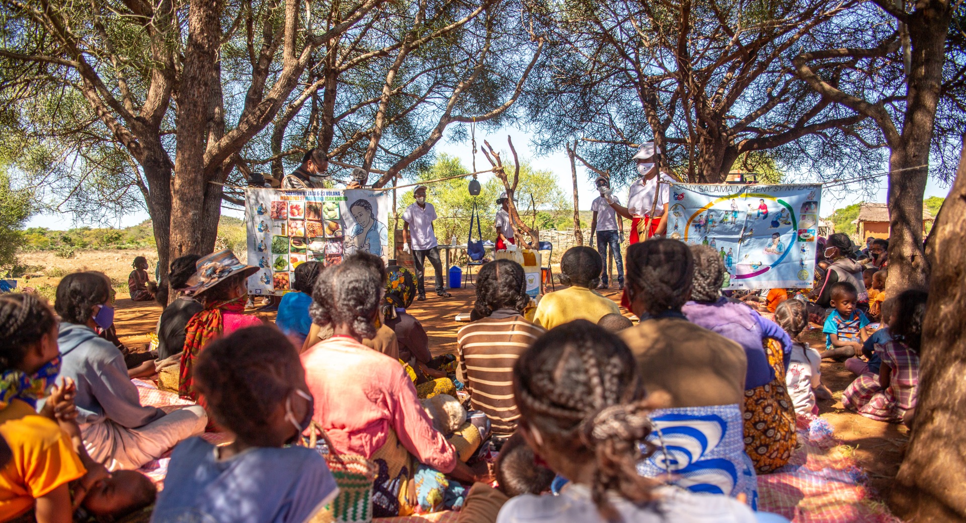 Our mobile response team hosts an education session with mothers of malnourished children.