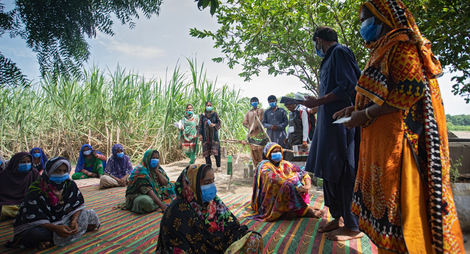 Ashraf Qasqariya, a trainer at the Farmer Field School (FFS), conducts a Community Mobilization Session on Kitchen Gardening in Jamot Village