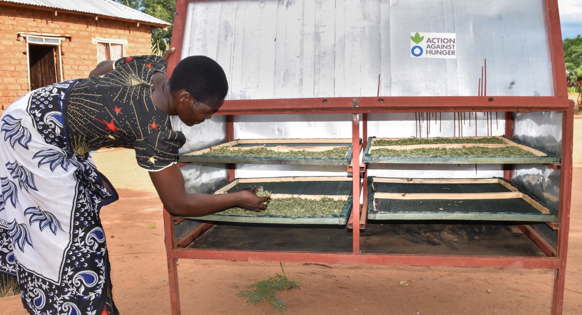 Anceran preserves her crops using solar driers.