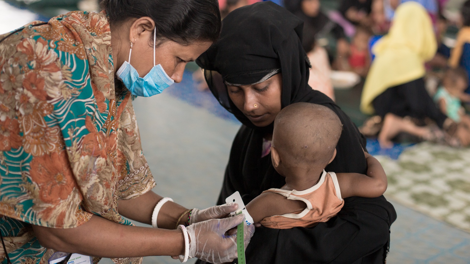A child is measured for malnutrition at one of Action Against Hunger's nutrition centers in Cox's Bazar.