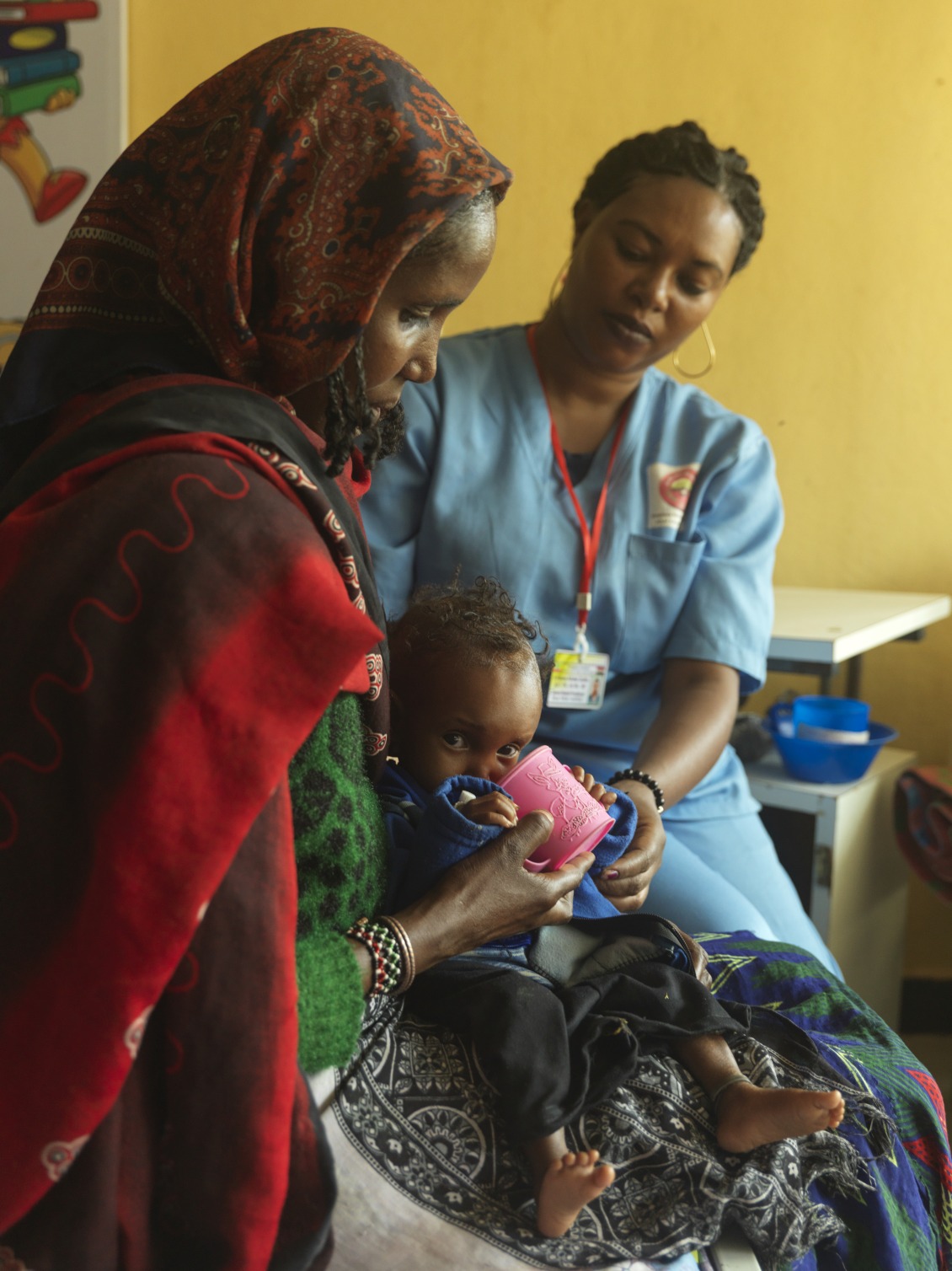 Nurse Ware cares for a child in Ethiopia.