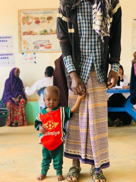 Adan stands inside the Nutrition Treatment Center.