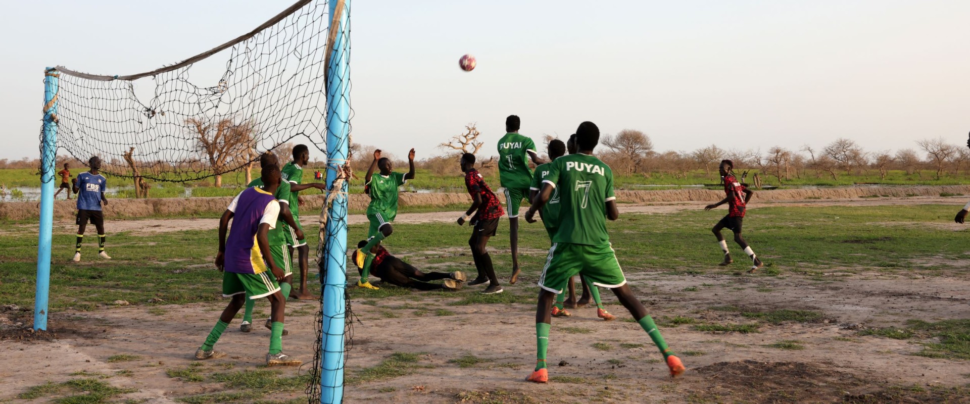 With the score tied 1-1 in extra time, players scramble to score a goal.