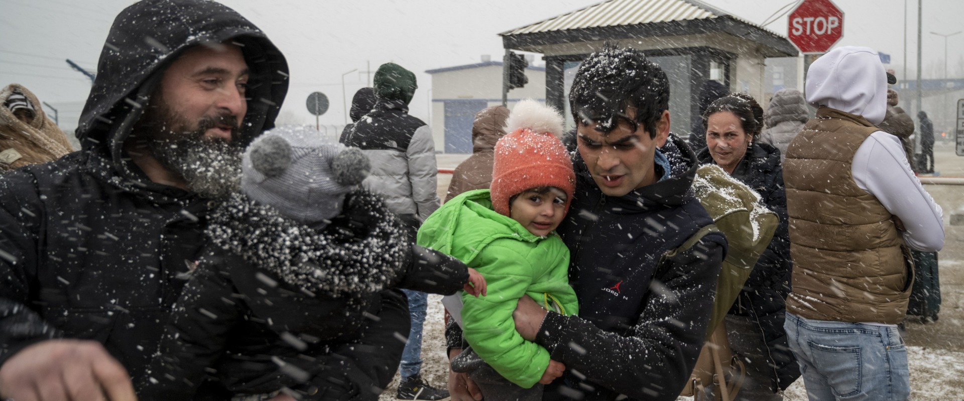 Ukrainian refugees face winter weather as they cross the border into Moldova.