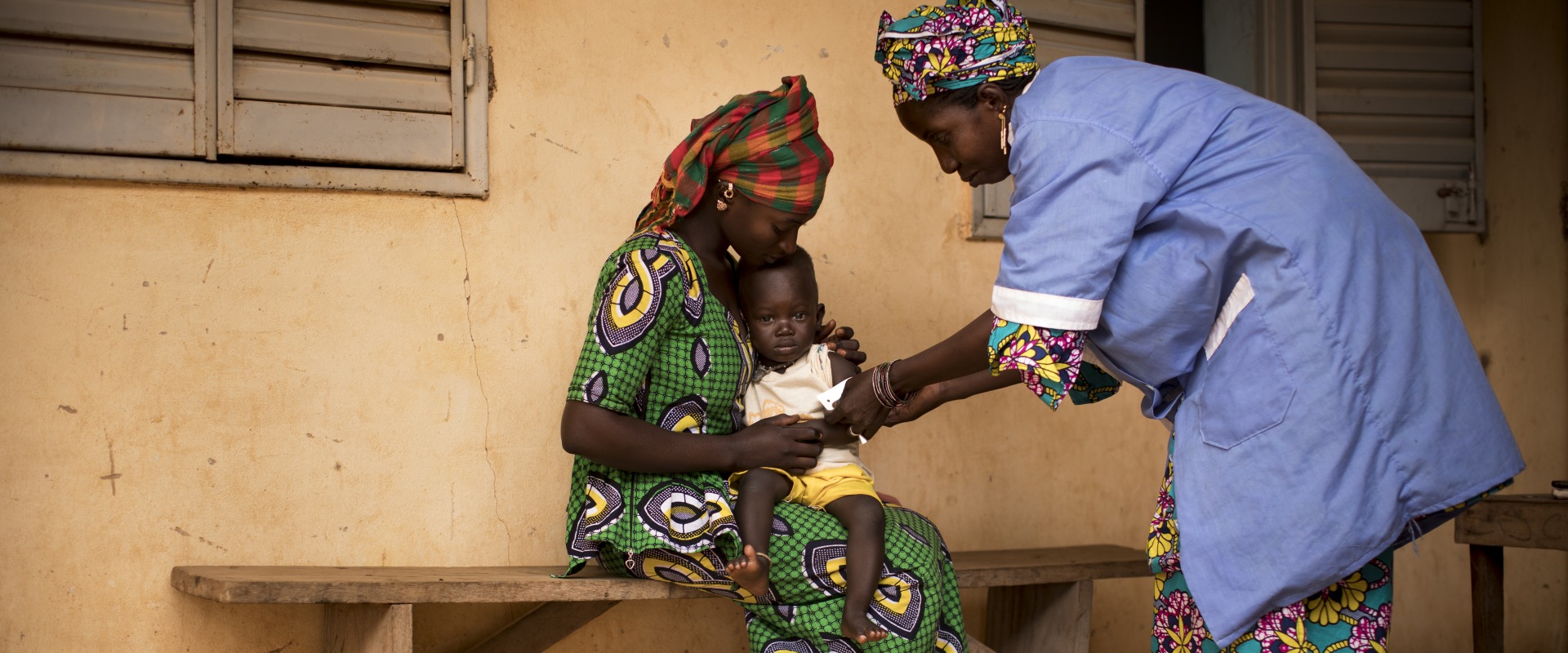 Naré Tounkara, matron of the Boudofo Community Health Center in Kita, Mali, measures a child for malnutrition.